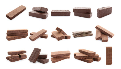 Set of different delicious crispy wafers on white background. Sweet food