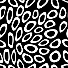 Abstract  seamless pattern with white circles on black background. Animal print. Decorative vector stock illustration for posters, card, postcard, fabric, textile.