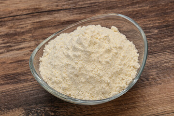 Wheat flour heap in the bowl