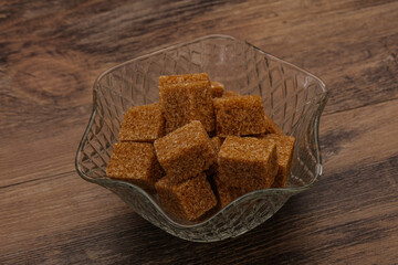 Cane sugar cubs in the bowl