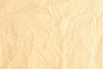 Old pale yellow crumpled paper background texture