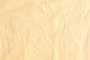 Old pale yellow crumpled paper background texture