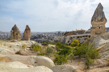 Beautiful mountain landscape with cave houses in Cappadocia valley near Goreme, Turkey