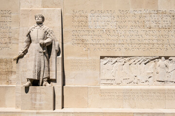 statue of Protestant figures on the Reformation Wall in Geneva