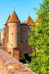 Warsaw Barbican fortified outpost as part of brick and stone historic defence walls in Stare Miasto...