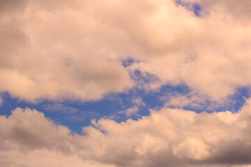 Fototapeta na wymiar Light cumulus clouds in the blue sky