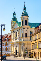 Fototapeta na wymiar Facade of Pauline Order Church of Holy Spirit - kosciol sw. ducha - at Freta street in historic New Town quarter of Warsaw, Poland