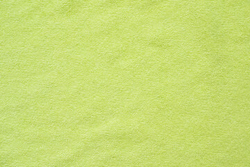 Green towel fabric texture surface close up background