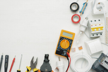 Electric equipment and accessories concept flat lay background with copy space. Electrical works.