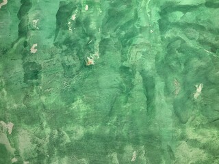 Cement walls painted in green