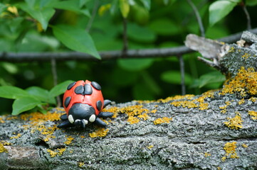 Figure of a ladybug made of plasticine.