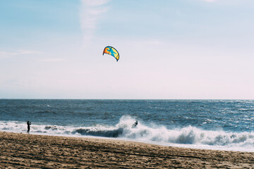 Kite surf in the ocean. Two silhouette. Paradise nature.