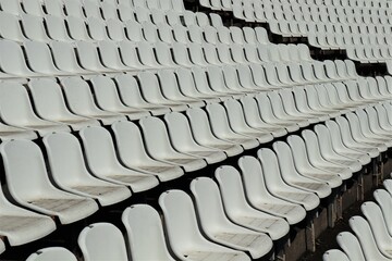 
Empty white dirty stadium seats