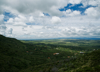 Idyllic landscape. Panorama view of the rural village Los Cocos in Córdoba, Argentina. The forest...
