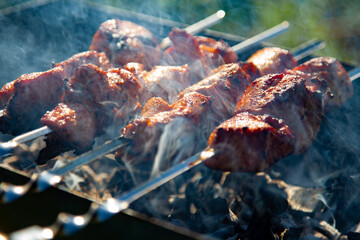 cooking barbecue pork on the grill