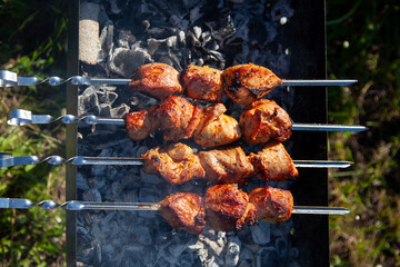cooking barbecue pork on the grill