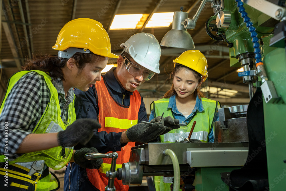 Poster Factory worker and engineer as team working in a factory.