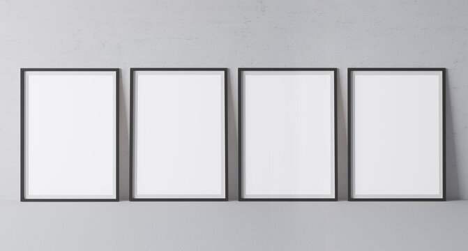 Black vertical frame mock up. Frame poster standing on gray floor. 3D illustrations.	