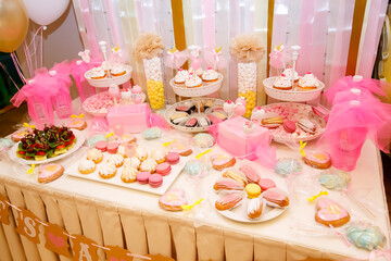 these are pink desserts on the children's table