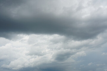 Nimbostratus clouds are dark, grey, featureless layers of cloud, thick enough to block out the Sun and produce persistent rain.