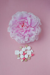 Allergy concept, flower and pills