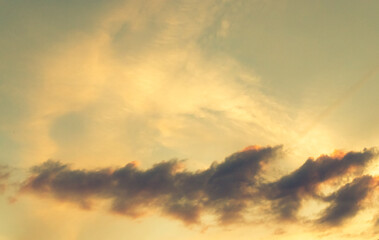 Gentle sunset colours over clouds