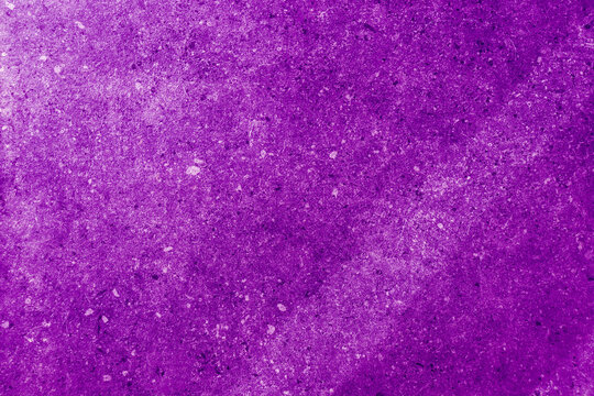 Texture glitter paper lilac color background. Lilac background with space for text.  Pink glitter background sparkling shiny wrapping paper texture 
