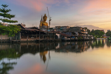 Big buddha statue in thailand at sunset