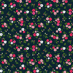 Elegant floral pattern in small red and pink flowers. Liberty style. Floral seamless background for fashion prints. Ditsy print. Seamless vector texture. Spring bouquet.