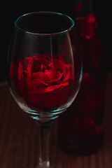 Red rose in a wine glass