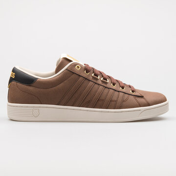 VIENNA, AUSTRIA - AUGUST 14, 2017: K-swiss Hoke CMF brown sneaker on white background.