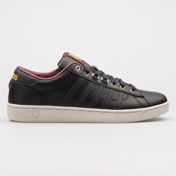 VIENNA, AUSTRIA - AUGUST 14, 2017: K-swiss Hoke CMF black sneaker on white background.