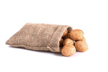 walnuts closeup in a fabric bag. Isolated