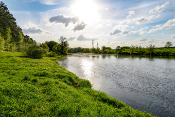 Fototapeta na wymiar landscape with river, green grass and trees