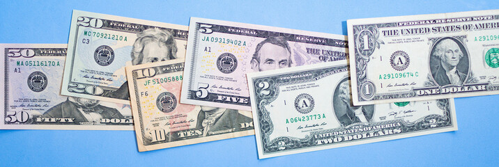 background with american dollar bills with different values