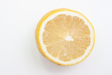 half a lemon on a white background