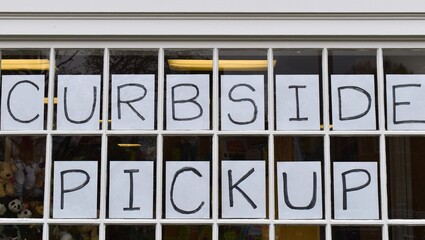 Westfield, NJ 04/18/20: Curbside Pickup Sign In Front Of The Town Book Store In Westfield, NJ New Jersey Due To The Coronavirus / Covid-19 Global Pandemic