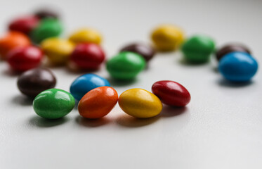 colorful candies on a white background macro photo