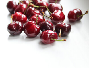 ripe cherries on a white background close up