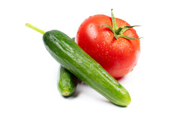 healthy fresh vegetables, cucumber and tomato over white background.
