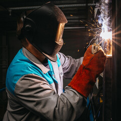 welder welding steel