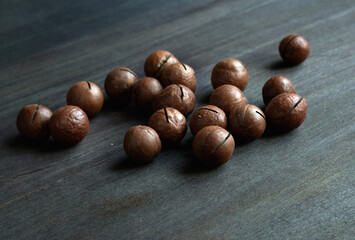 An apple sitting on top of a wooden cutting board