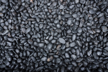 rock or stone on the floor or Black  stones background or dark background 