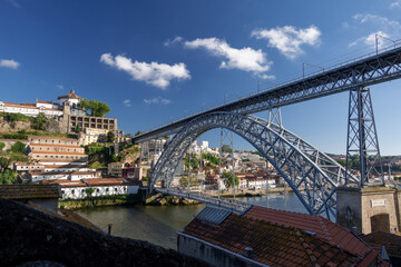 Fototapeta na wymiar The Dom Luis I Bridge Porto Portugal Spanning The Douro River