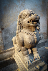 Statue of a lion guarding the temple in Kathmandu