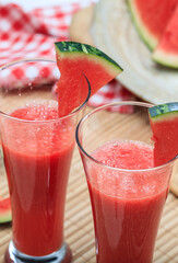 Watermelon juice glasses closeup view, fresh healthy refreshment