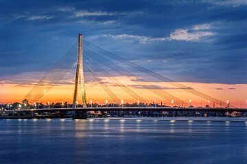 cable-stayed bridge against the sunset sky