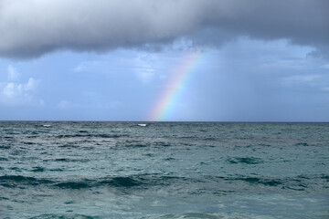 rainbow over the atlantic ocean