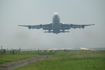 Fototapeta na wymiar B747 Foggy Departure