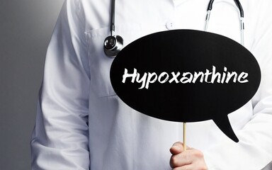 Hypoxanthine. Doctor with stethoscope holds speech bubble in hand. Text is on the sign. Healthcare, medicine